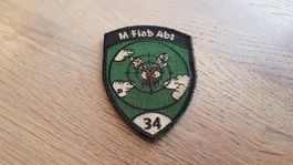 Badge M Flab Abt 34 gold