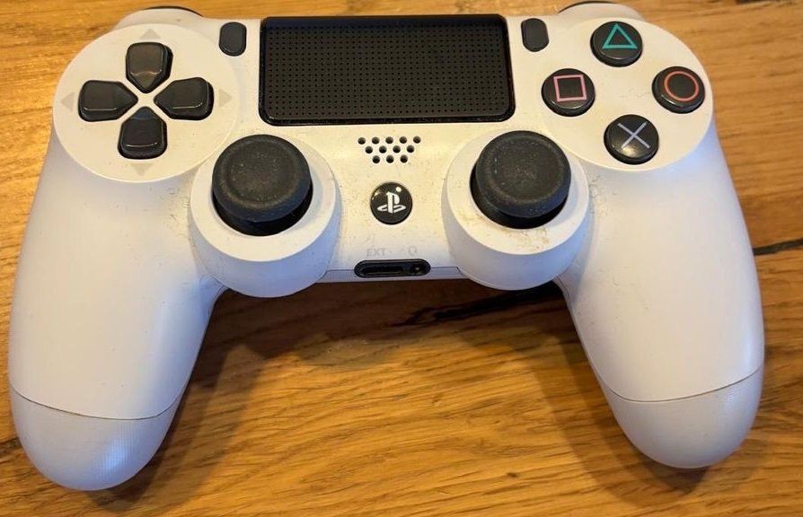 Manettes: Weisser PS4 Controller Dualshock 4 – D'occasion à Nidau par EXP40