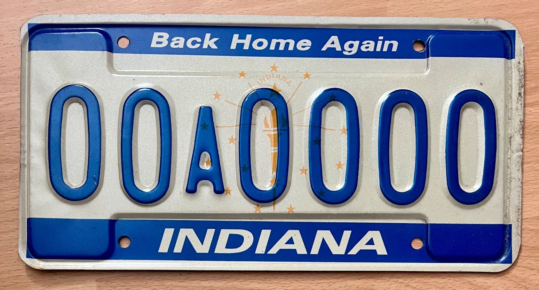 Insegne: Indiana USA Nummernschild 00A000 "Back Home Again" – Usato da Wolfhalden venduto da 19651979