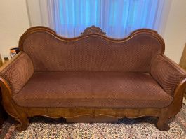 Antikes Sofa aus Holz mit braunem Bezug gebrauchter Zustand