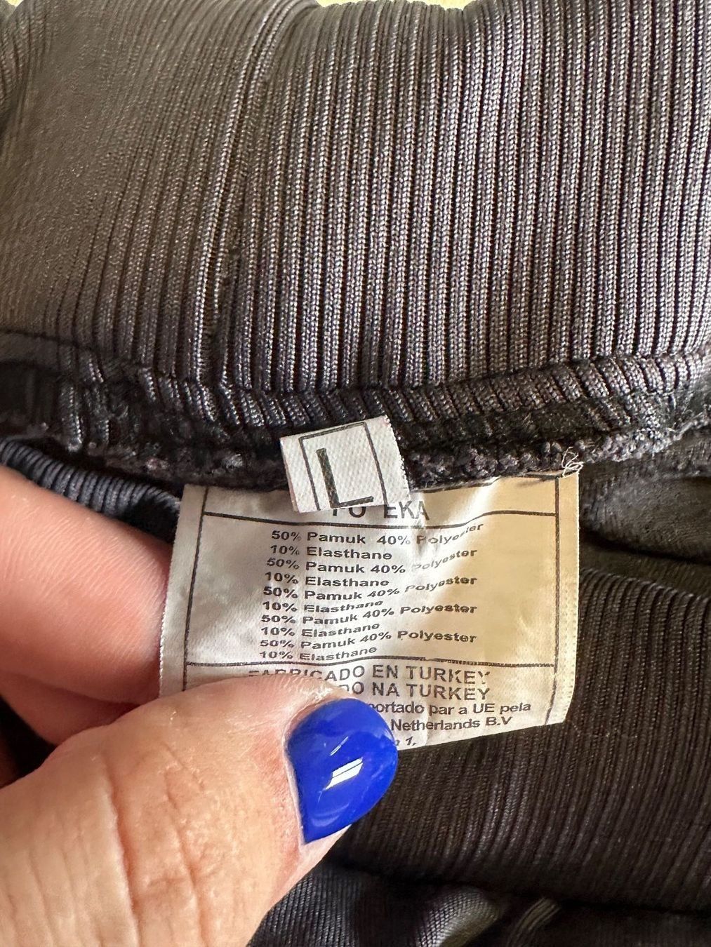 Pantaloni: Graue Trainerhose mit pinken Streifen – Usato da Neuchâtel venduto da Dualseele 1