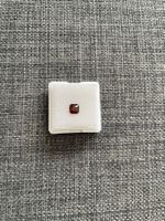 Spinell Dunkelorange / Rot, 0.95 Karat