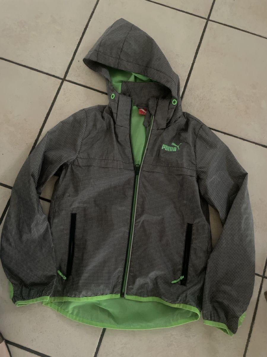Puma Vestes & Manteaux: Puma Regenjacke Gr. 140 mit Netzfutter Neu – Neuf avec emballage d'origine à Obergerlafingen par cabo4