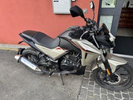 Motorrad: SYM NH-X 125