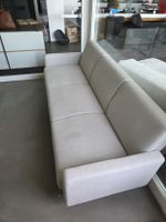 Light grey 3-seater sofa, comfortable and modern design.