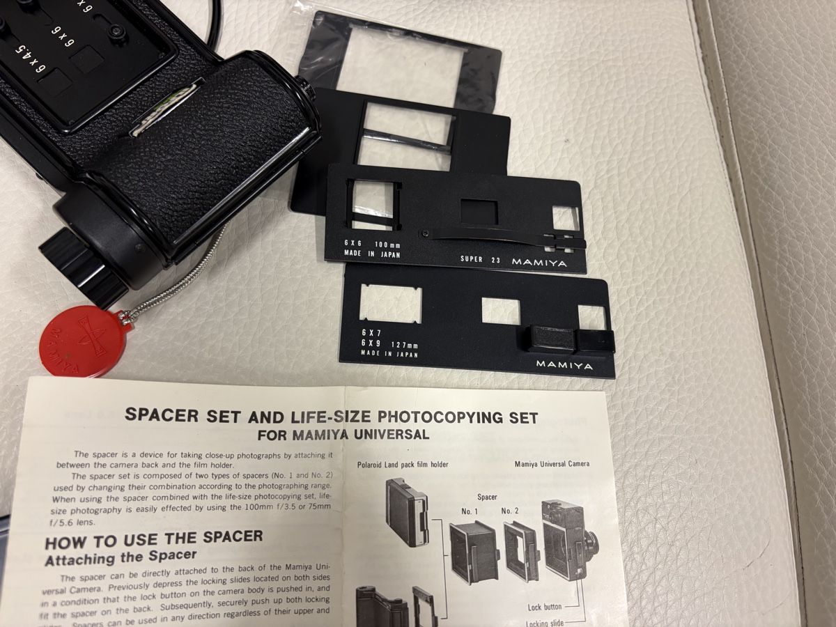 Mamiya Fotocamera: Mamiya Universal Schwarz Mittelformatkamera mit Zubehör – Usato da Dietikon venduto da cre8different 5