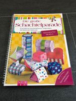 Buch über die grosse Schachtelparade