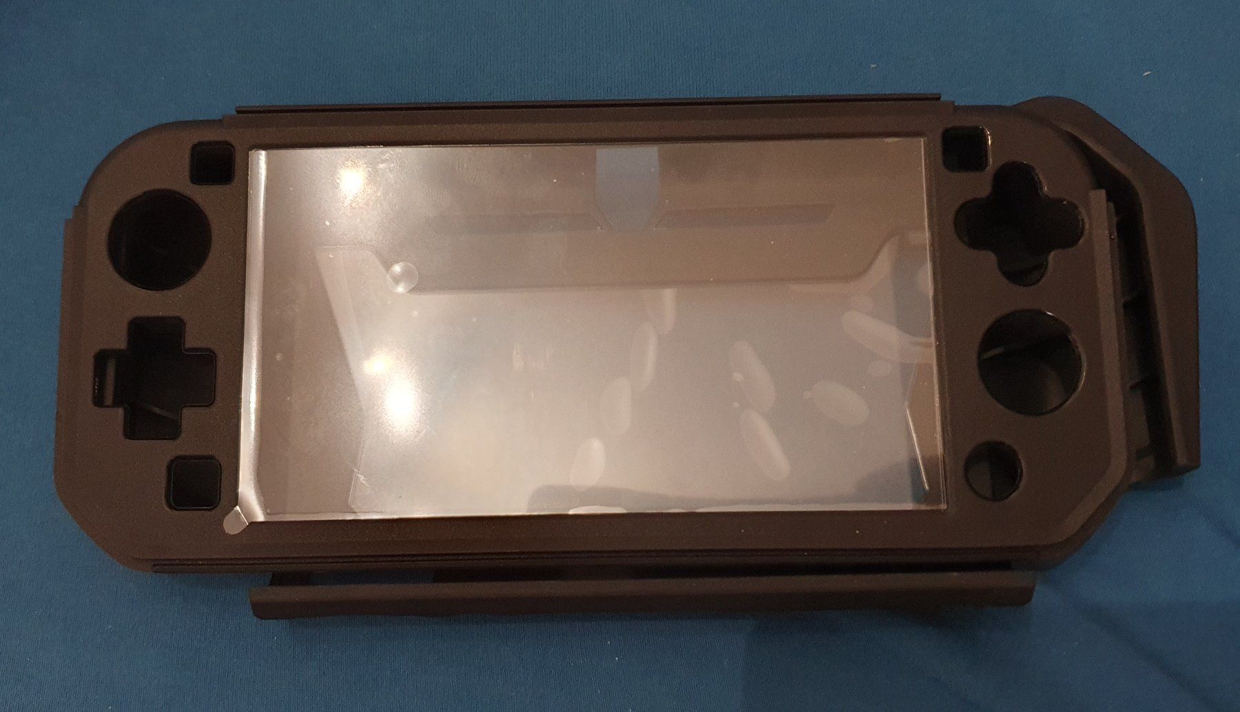 Nintendo Console: Nintendo Switch Lite Ergonomic Case Schwarz – Nuovo (secondo la descrizione) da Klingnau venduto da Fee1960