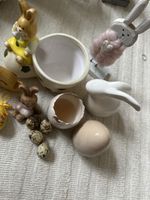 Spring Easter decorations: bunny, egg, quail eggs, pots