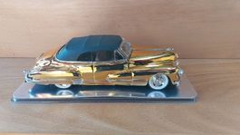 1947 Cadillac Serie 62.  1:18 in Gold Edition