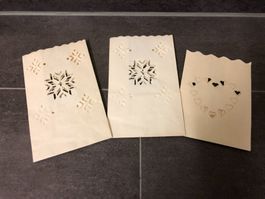 Drei Leuchttüten aus Papier