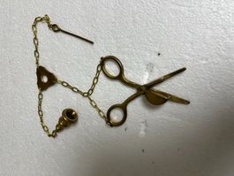 Schere Docht-Schere mit Löscher +Aufrichter im Kettenverbund