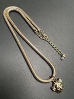 Goldige Kette mit Panter Anhänger