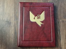Roter "Tübli" Sammelordner mit 31x4 Hüllen - 18x13.5cm