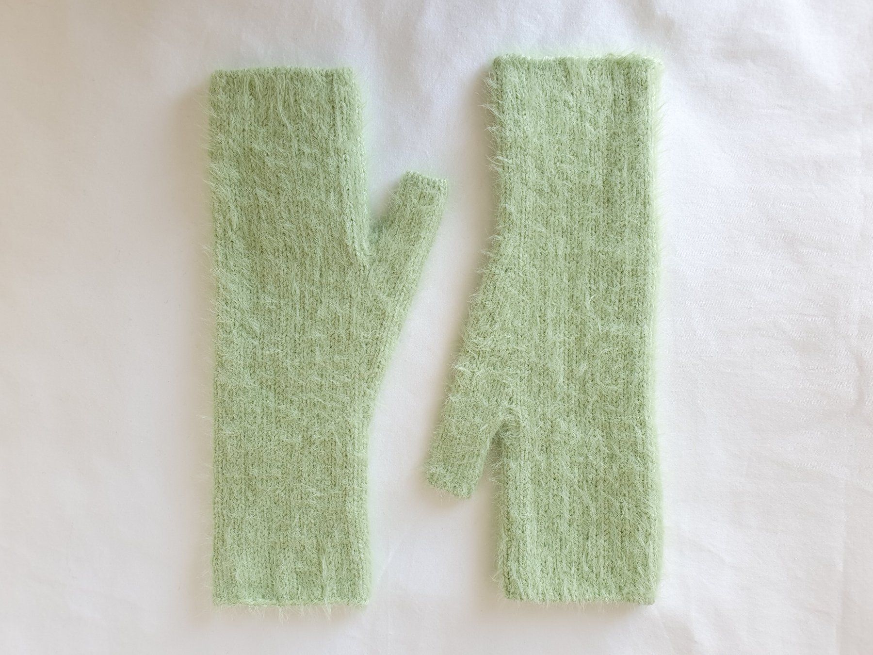 Guanti & manicotti: Handgestrickte fingerlose Handschuhe – Nuovo e nell'imballaggio originale da Neunkirch venduto da Sandramay 1