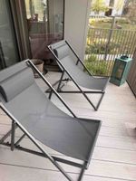 Two foldable deck chairs grey metal frame like new