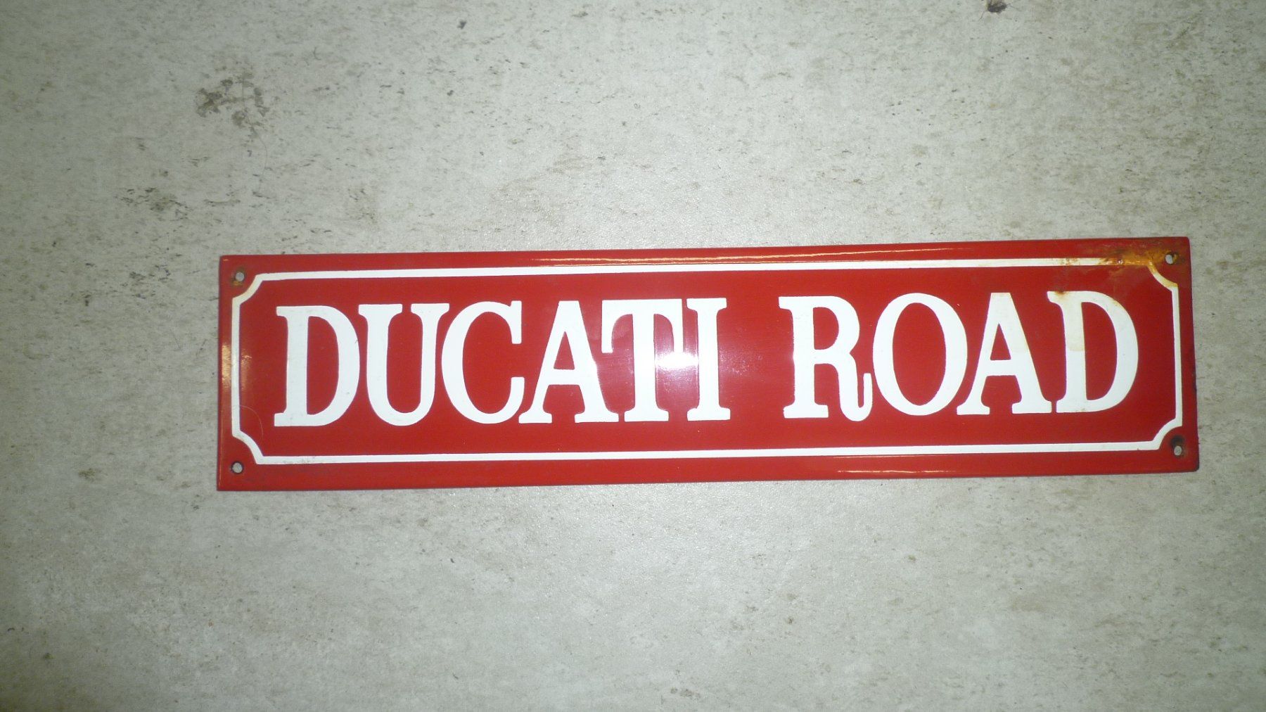 Ducati Insegne: DUCATI Schild Emailiert – Usato da Sissach venduto da Gruetter-Moto-Center