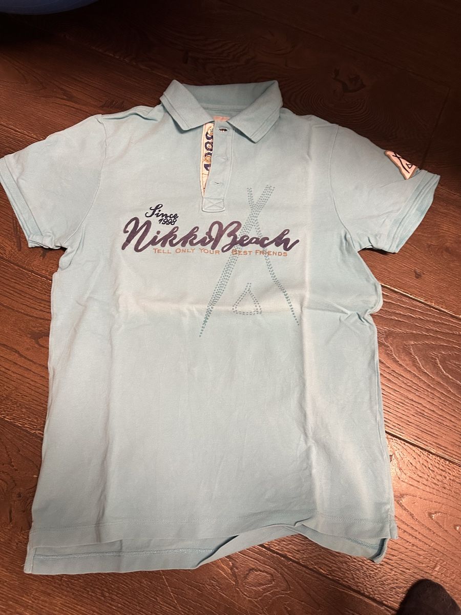 Magliette Polo: Nikki Beach Polo Shirt, hellblau, Gr. M – Usato da Büren SO venduto da Nico59