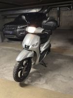 Peugeot 125i + case 32l