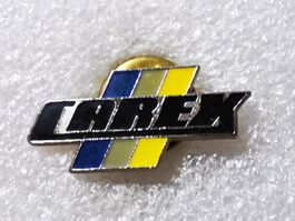 Ansteckpin 44: Caretex