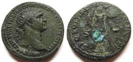TRAJAN bronze dupondius (107 AD) - trophy with 2 shields