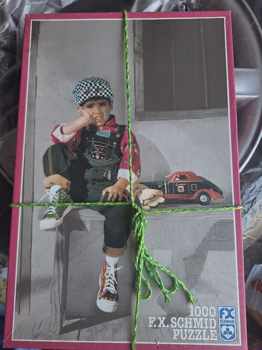 Puzzle: F.X. Schmid Puzzle 1000 Teile Junge mit Auto  – Usato da Aarau venduto da Chillkrot