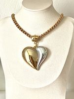 Gold-Silver Heart Necklace made of gold-plated steel.