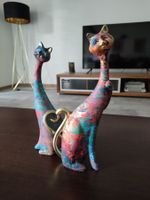 Ensemble de sculptures de chat coloré en résine
