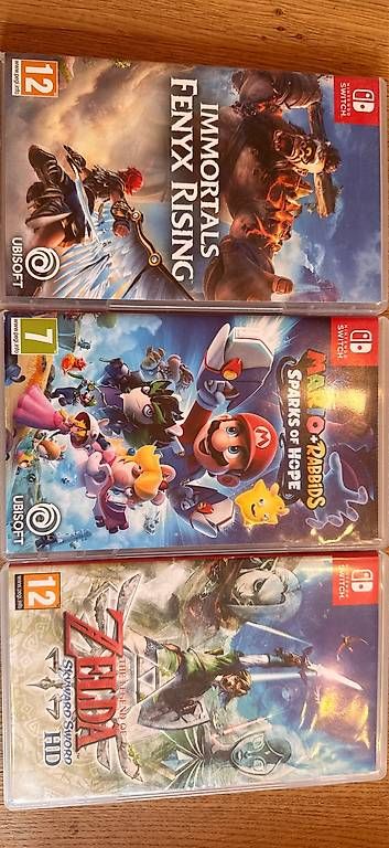 Nintendo Consoles: Nintendo Switch, OLED mit drei Spiele – D'occasion à Appenzell Eggerst. par MagischeWelt 3