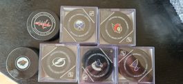 Divers pucks officiels NHL (1 pièce)