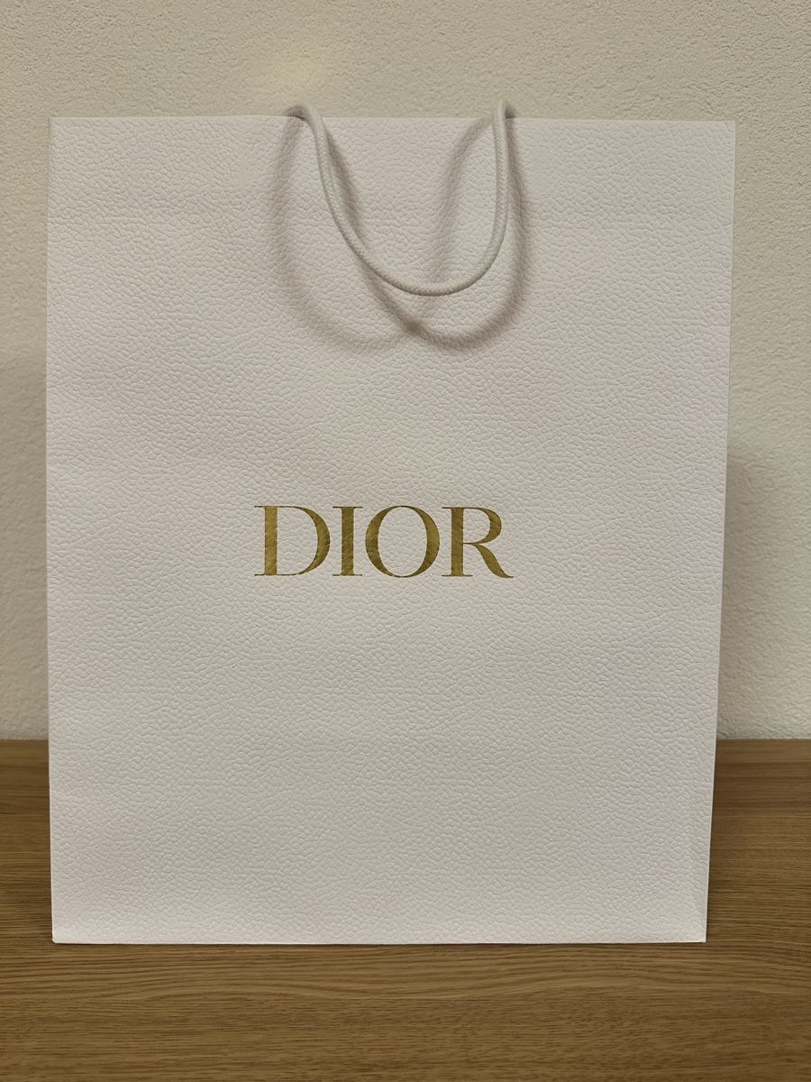 Dior Borse: DIOR Einkaufstasche Papier weiss mit Sternanhänger – Usato da Langnau am Albis venduto da Flash2585