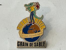 1 Pin Globetrotter Grain de Sable