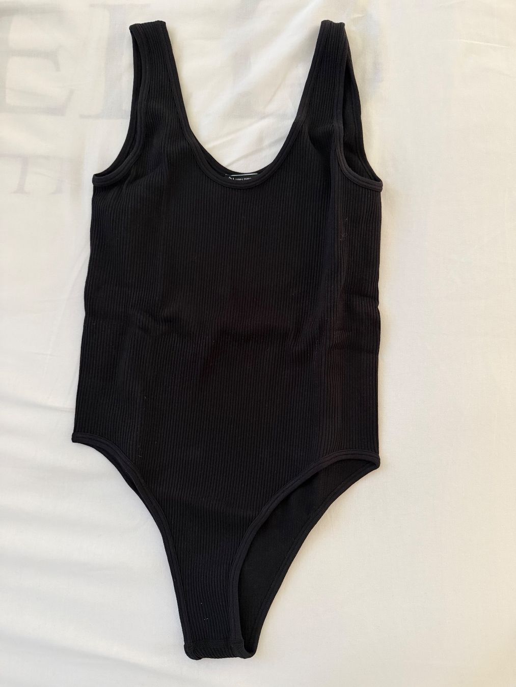 Zara Top: Gerippter Body in schwarz – Usato da Zürich venduto da nat_9yf2