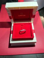 Omega bague or blanc sertie entièrement