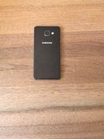 Samsung Galaxy A5 mit Hülle und Kabel/Stecker