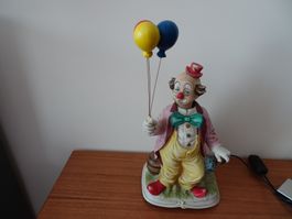 Porzellan - Clown   : pfeiffender Clown  mit bewegbarem Kopf
