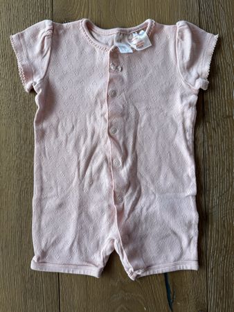 Hellrosa Strickstrampler Grösse 68