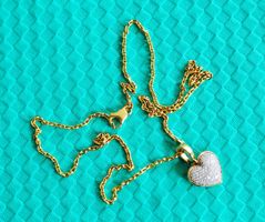 Goldkette 750k mit Herzanhänger mit Diamanten in 750k. GG.