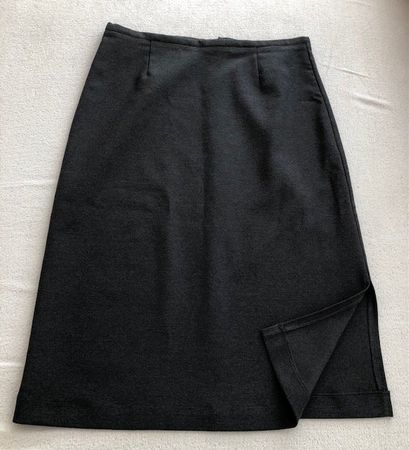 Jupe crayon noire fendue élégante 36