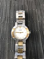 MONTRE SIGMA ACIER ET OR