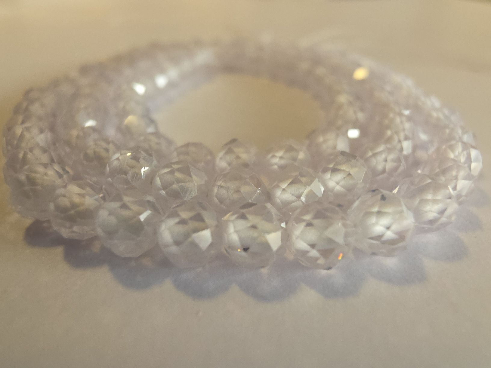 Mineralien & Heilsteine: Zirkon Weiss facettiert 4mm. Strang – Neu und originalverpackt aus Menziken von Mirager 3