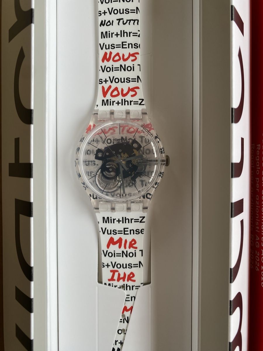 Swatch Orologi: SWATCH Aktionärsuhr 2026 – Nuovo e nell'imballaggio originale da Jakobsbad venduto da Koelbenera 2