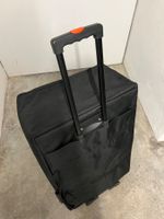 Schwarzer Rollkoffer