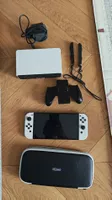 Nintendo Switch OLED Weiss + Etui AB 1 CHF