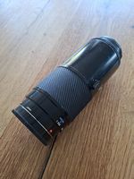 Minolta AF Zoom 75-300mm 1:4.5(32)-5.6, 55mm