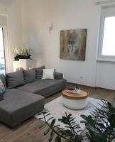 Grande tappeto beige