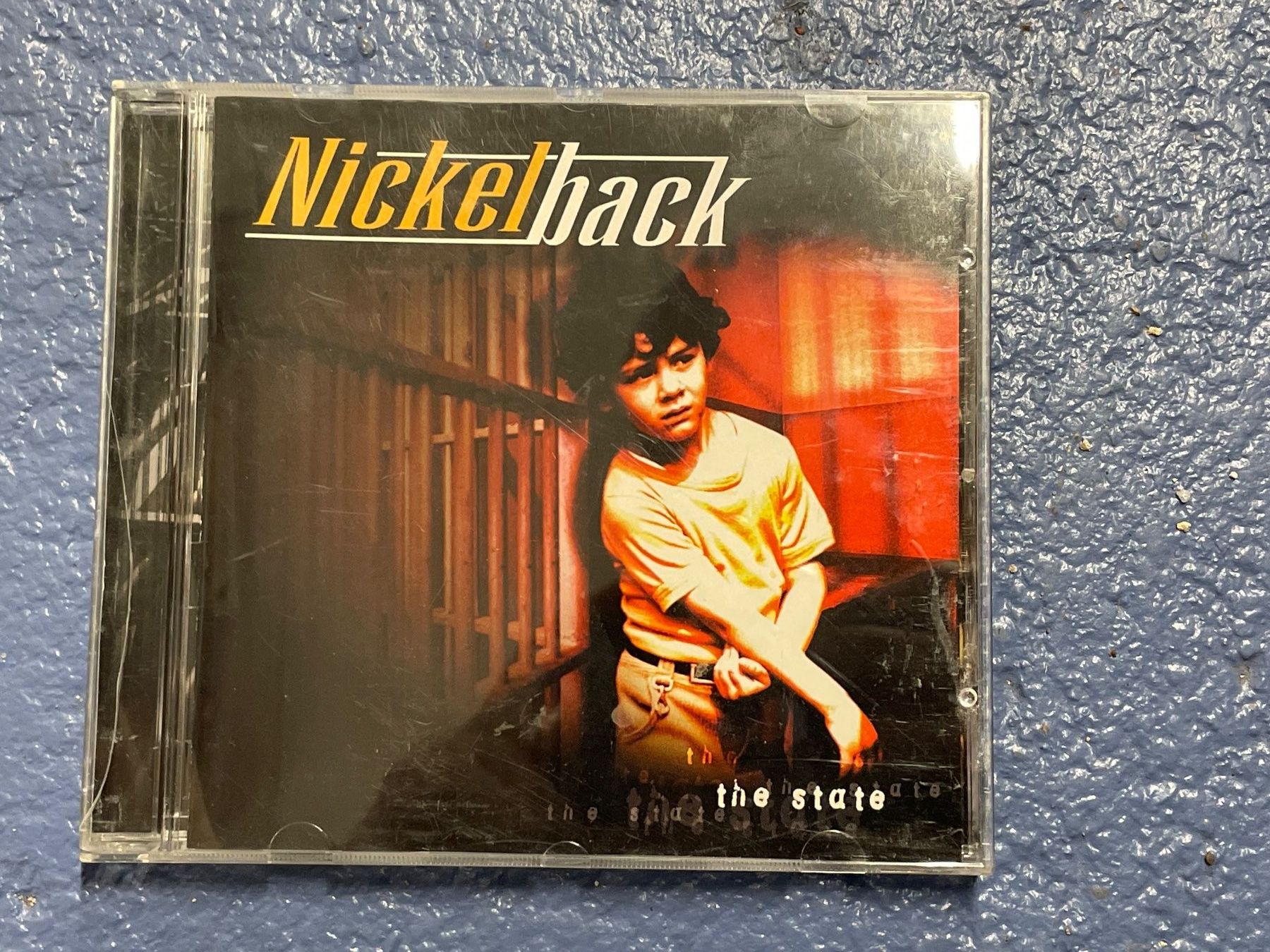 CDs: [CD] NICKELBACK - The State (2000/2001) – Gebraucht aus Frasnacht von DiskSelection