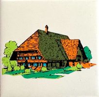 Emmentaler Bauernhaus auf weisser Kachel