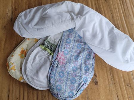 Baby Stützkissen 20 x 95 cm, mit drei Kissenanzügen