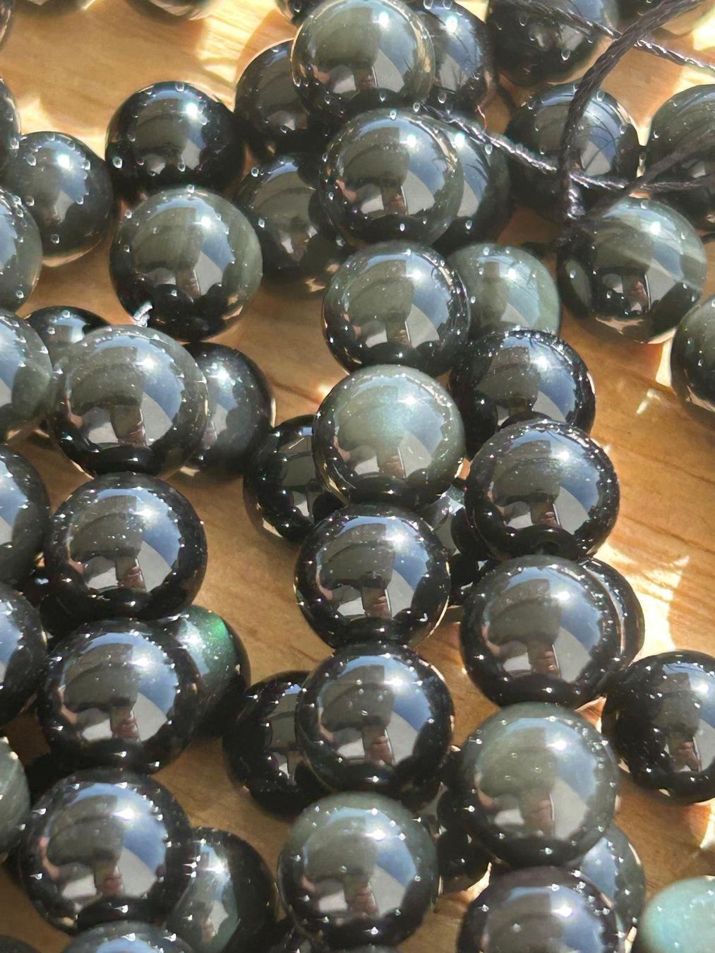 Minerali & Pietre curative: Strang echte rainbow obsidian Level 1 / stone beads 8 mm – Nuovo e nell'imballaggio originale da Niederrohrdorf venduto da Ytobi 2